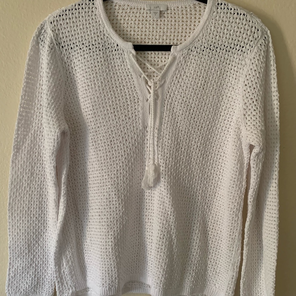 White knit sweater with tassel